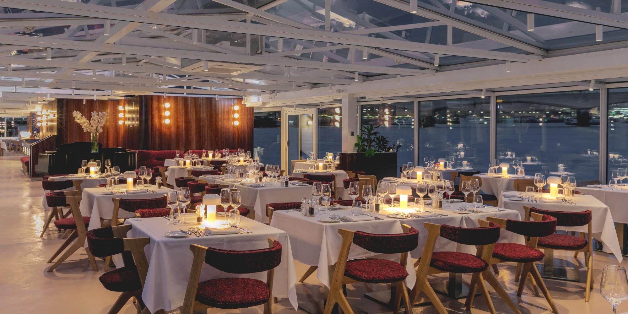 Enjoy a first class Thames New Year's Eve experience on board the newly refurbished Glass Room boat