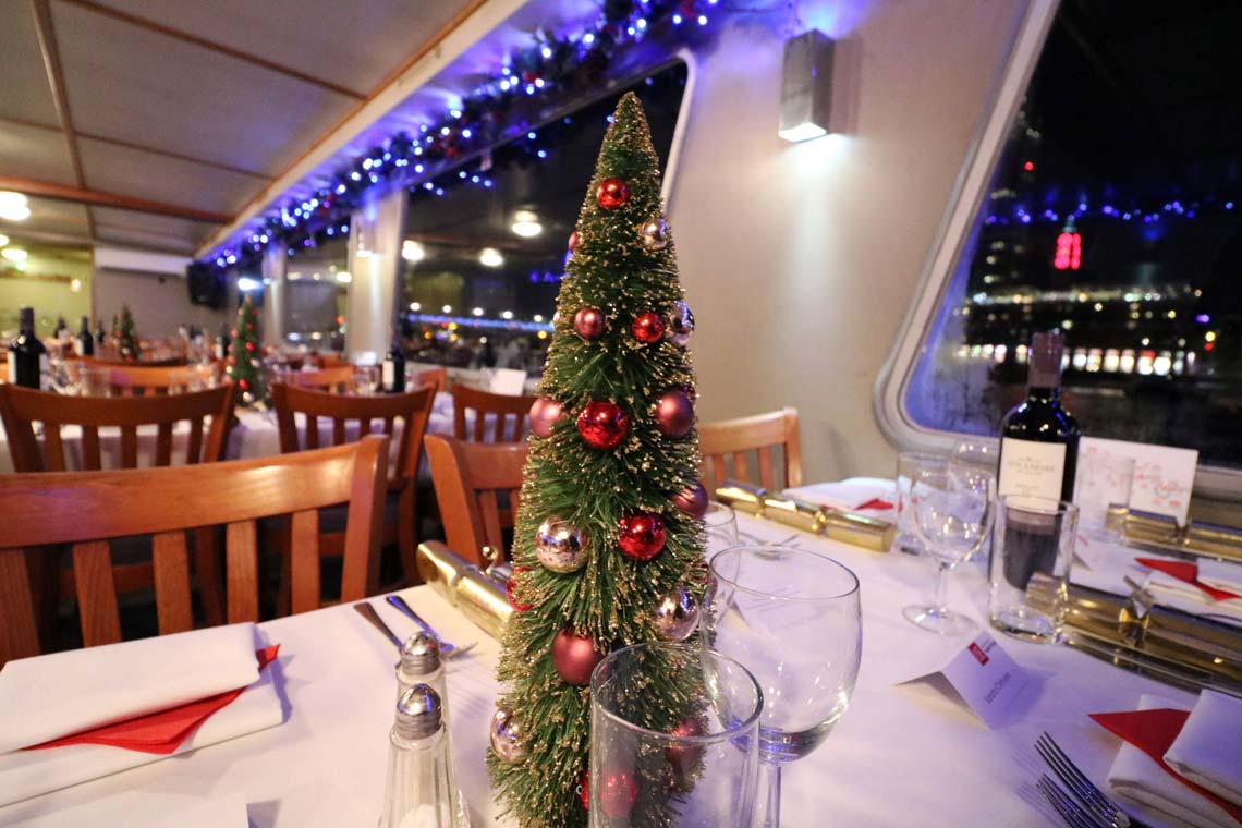 Festive decorations and glistening lights provide a jolly setting on board the Avontuur party boat.